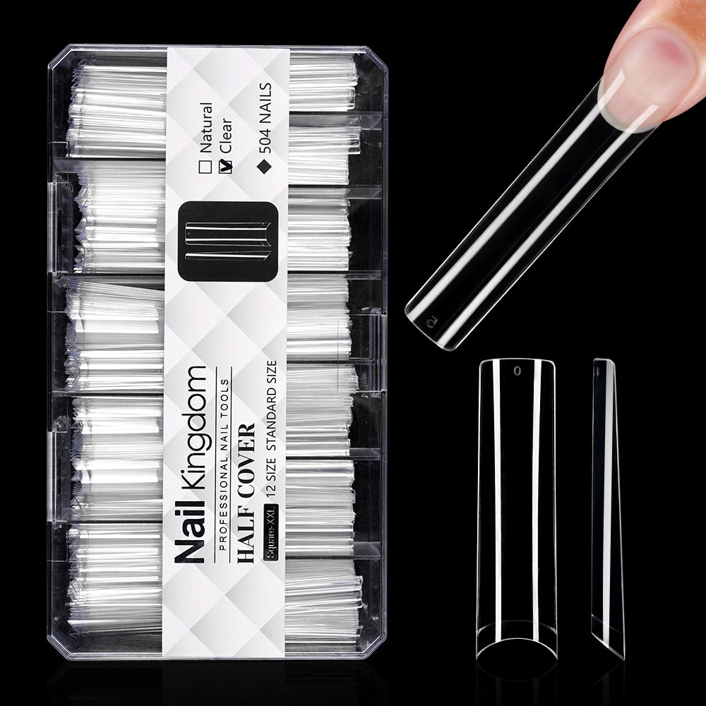 Nail Kingdom nail extension kit with clear nail tips and packaging on a black background