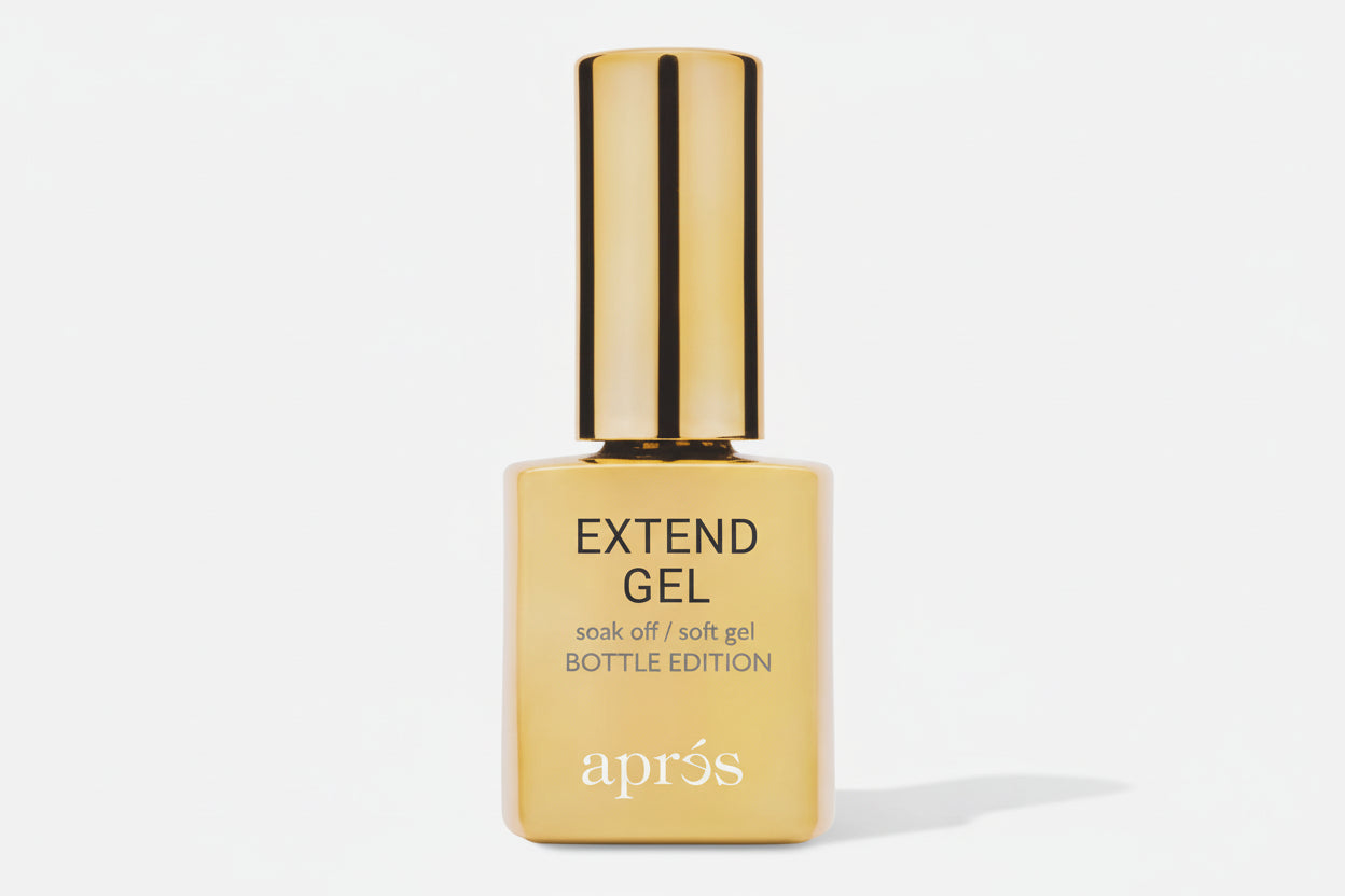 Gold bottle of Apres Extend Gel on a white background