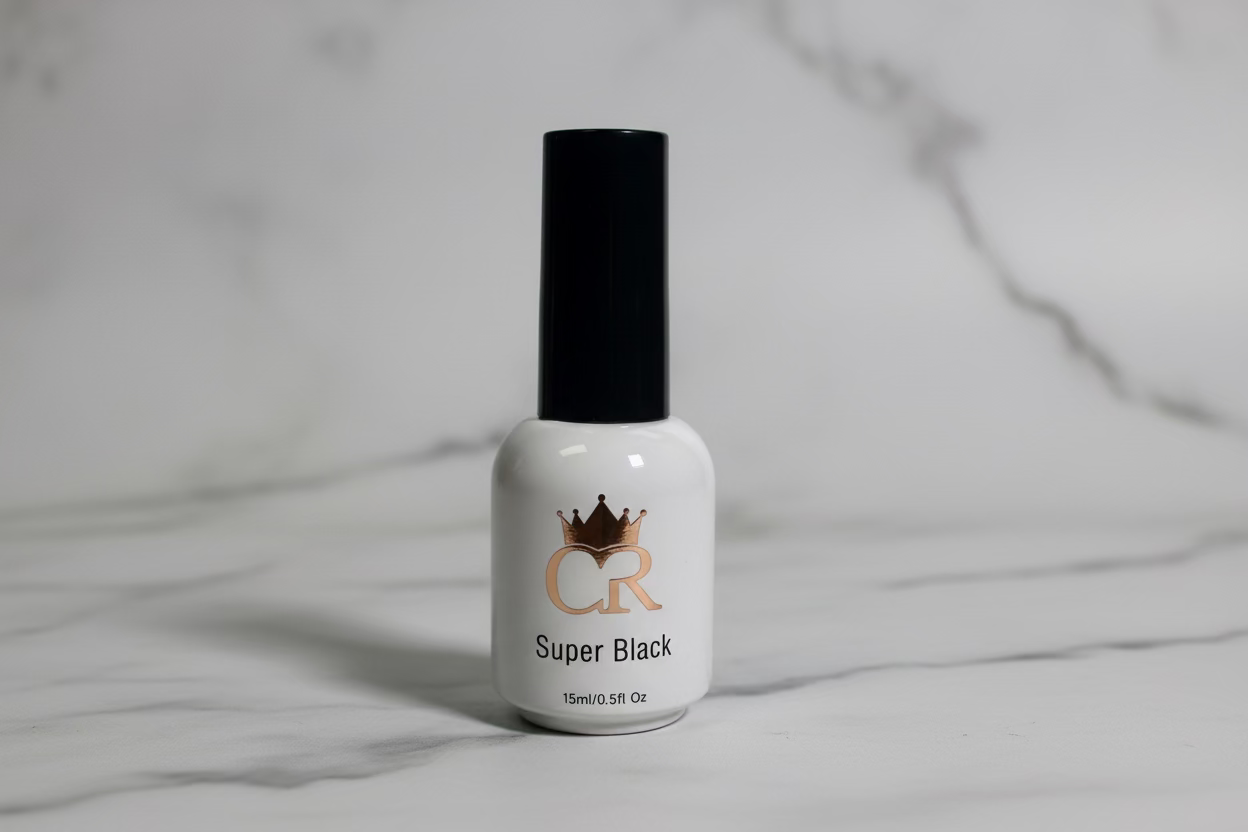 Bottle of CR Super Black nail polish on a white background