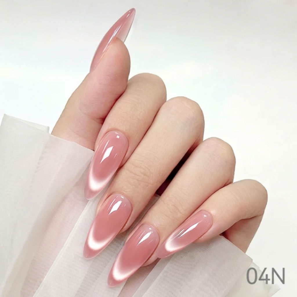 Hand with pink nail polish holding a bottle of nail polish, with 'Cre8tion' branding.