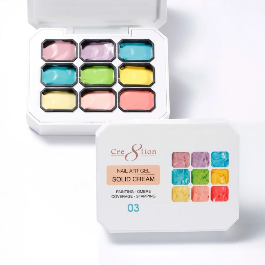 Set of nail art gel solid cream in a white box with colorful samples on a white background