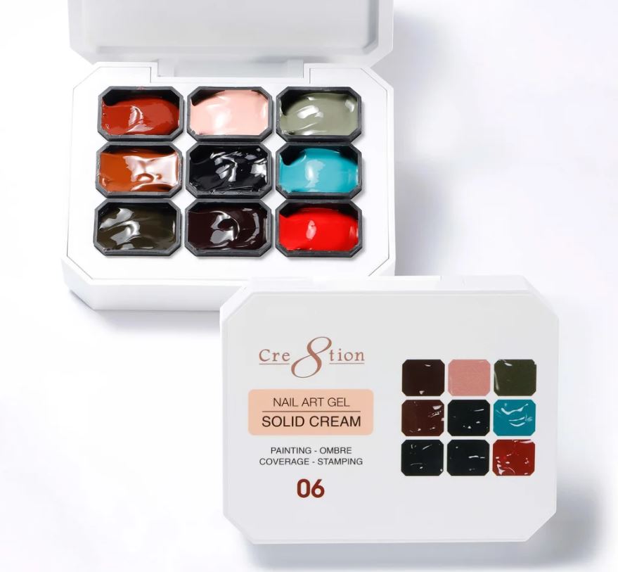 Nail art gel set with solid cream colors in a white box on a white background