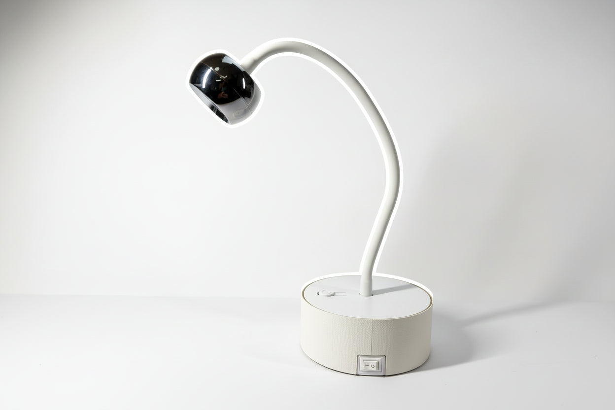 Wall-mounted lamp with a flexible arm on a plain wall