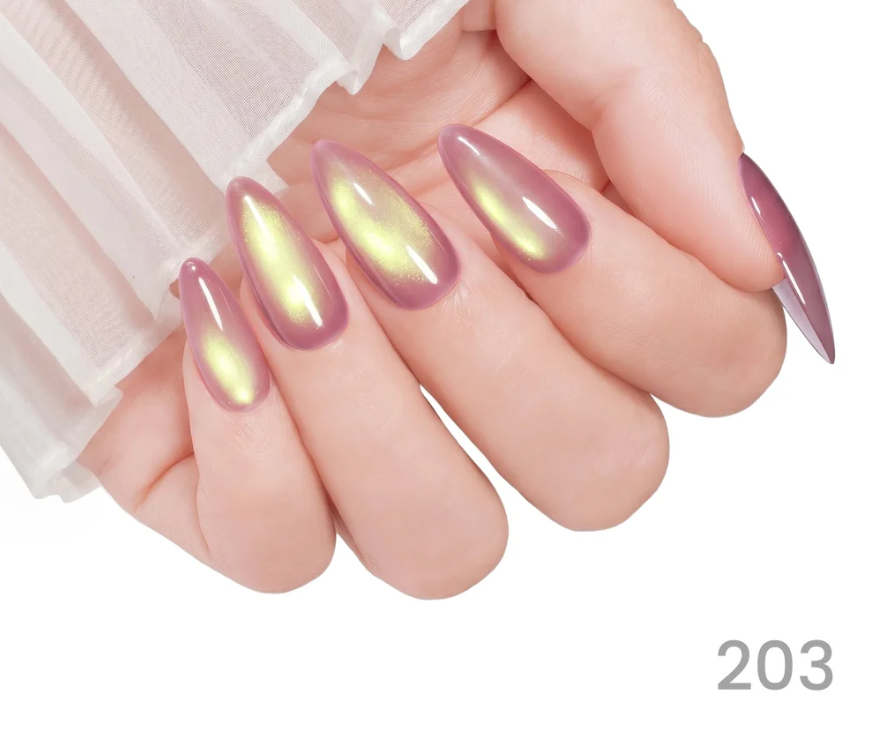 Close-up of a hand with long, pink and yellow gradient nails on a white background.
