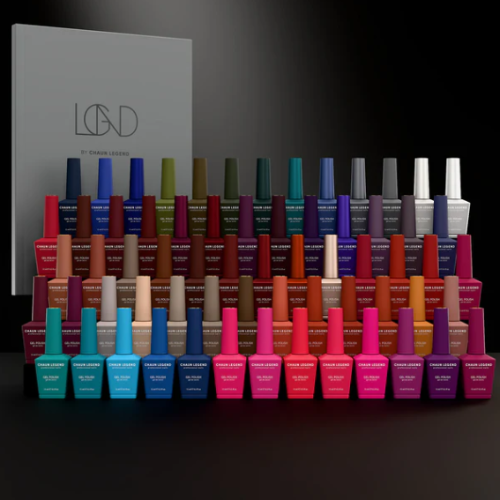 Collection of colorful nail polish bottles with a dark background