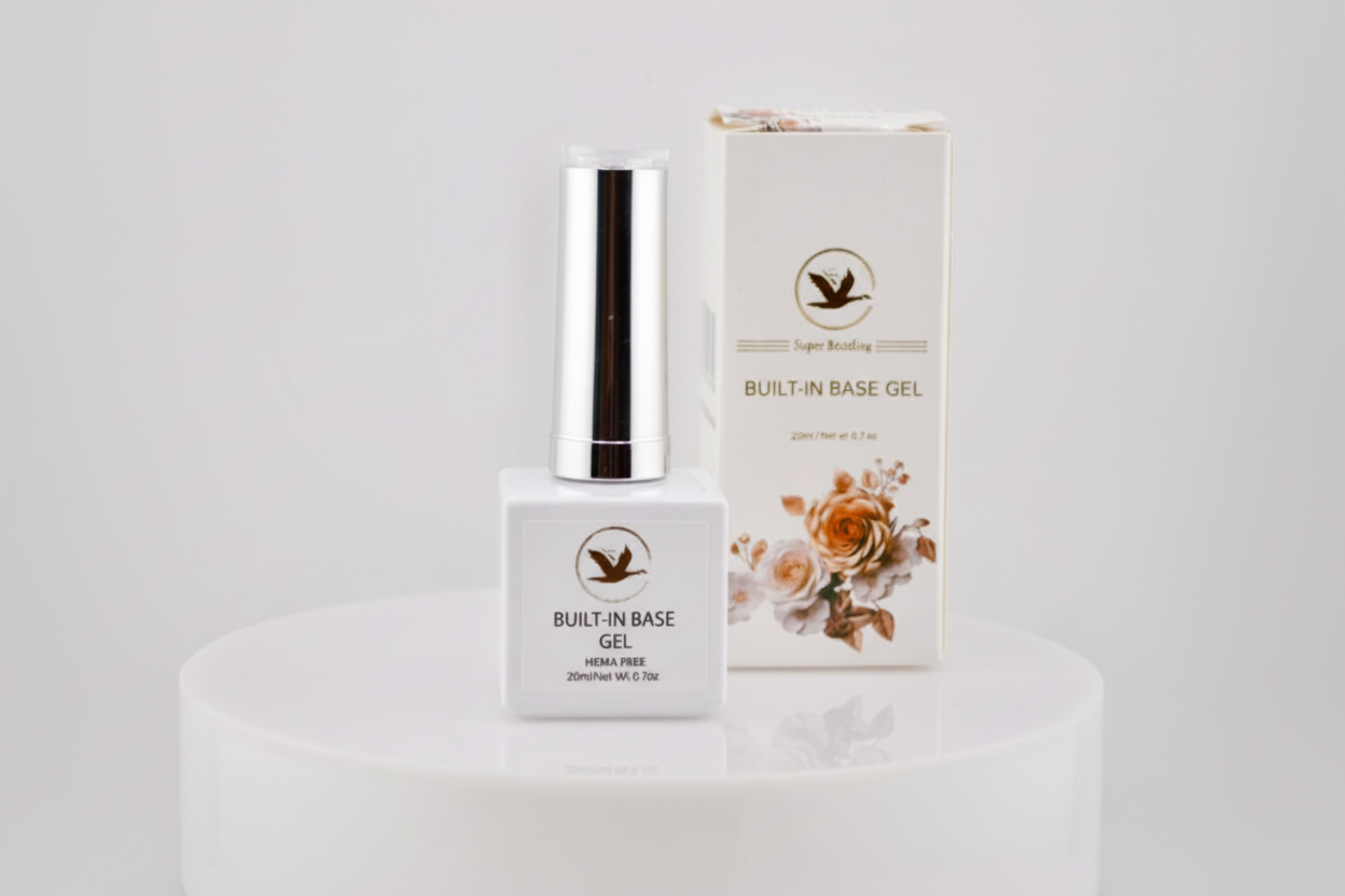 Bottle and box of Built-In Base Gel on a light gray background