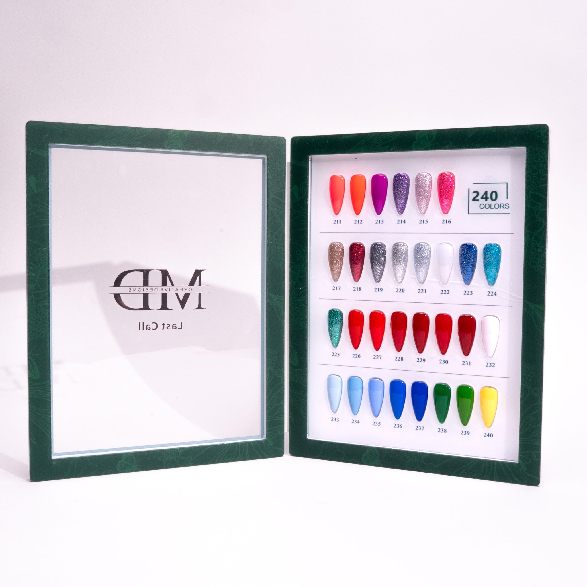 Open green frame displaying a color chart with nail polish samples on a white background