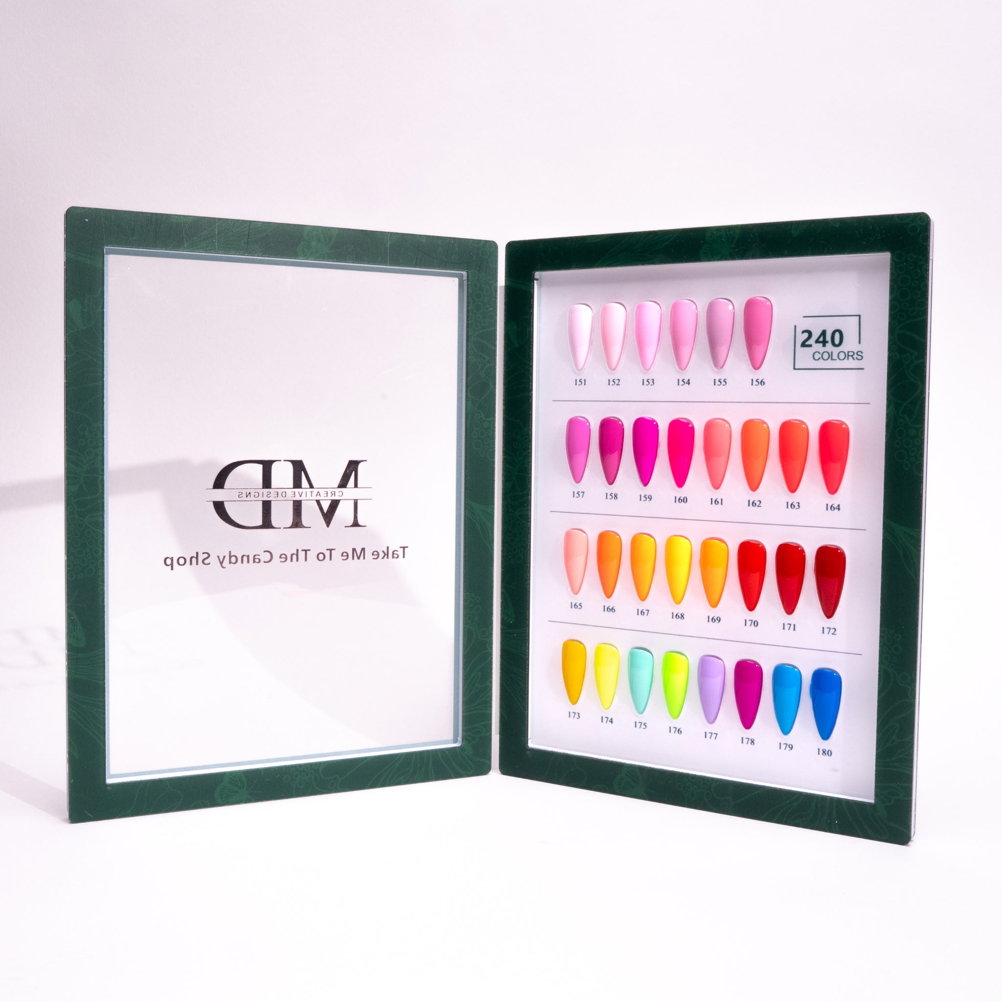 Open green frame displaying a color chart with nail tips on a white background