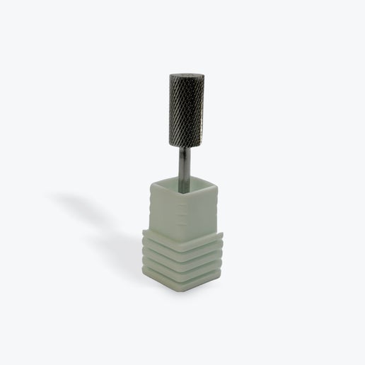 Square-shaped tool bit with a cylindrical head on a white background