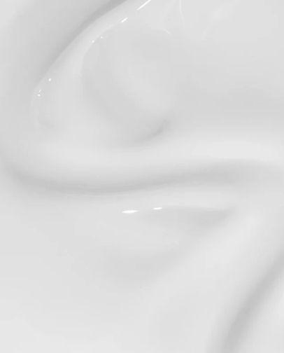 Close-up of a white ceramic plate with a glossy finish