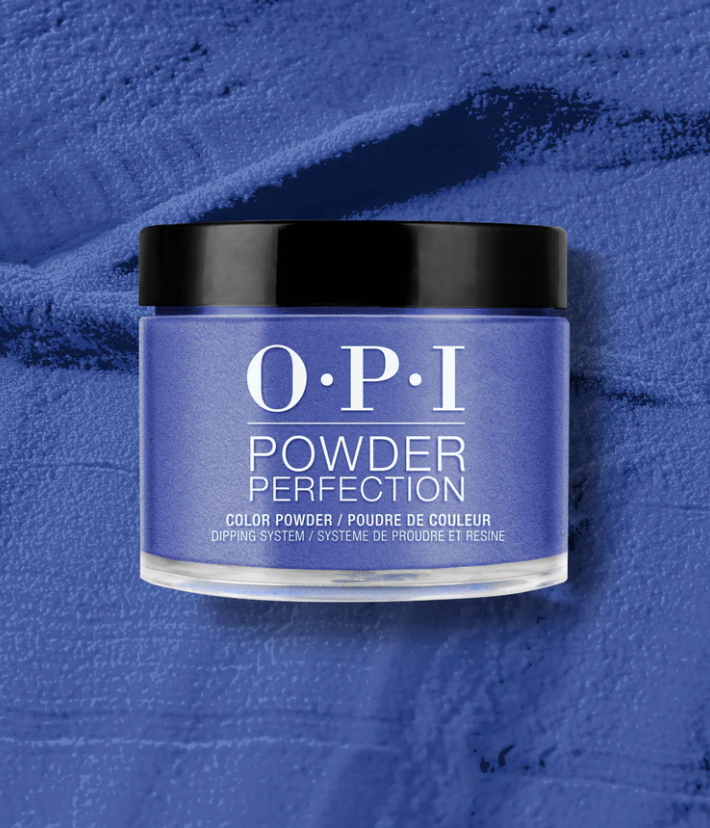 OPI Powder Perfection container on a blue textured background