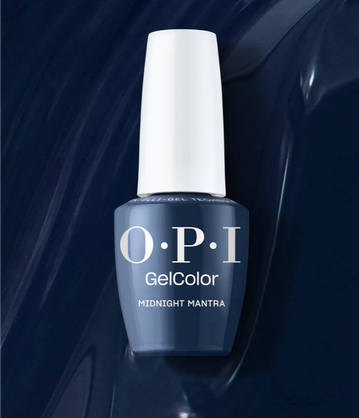 OPI GelColor nail polish bottle with 'Midnight Mantra' on a dark background