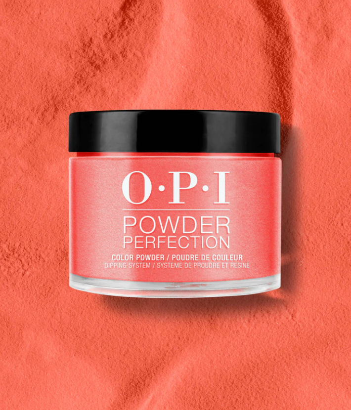 OPI powder perfection container on a coral background