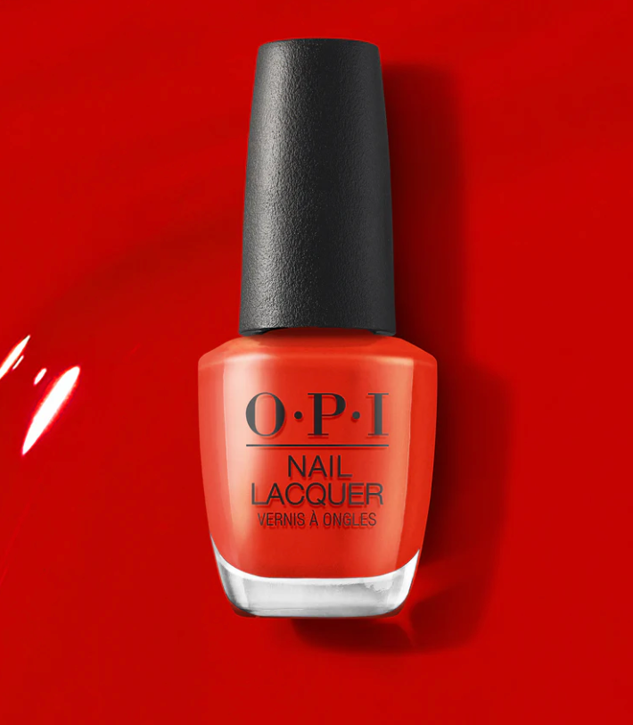 OPI nail polish bottle with black cap on a red background