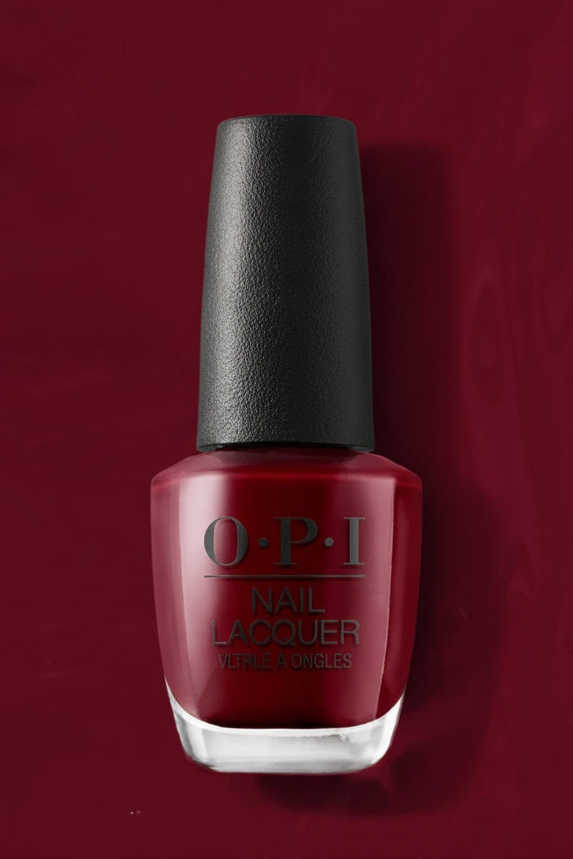 OPI nail polish bottle on a red background