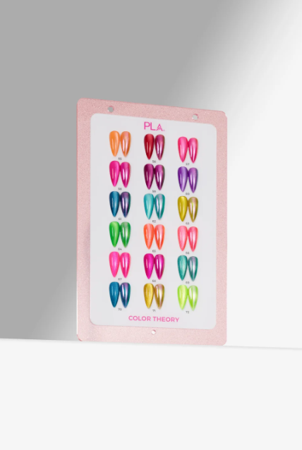 A pink PLA Color Theory display card showing multiple rows of colorful nail tips in various shades and finishes, photographed against a clean light gray background.