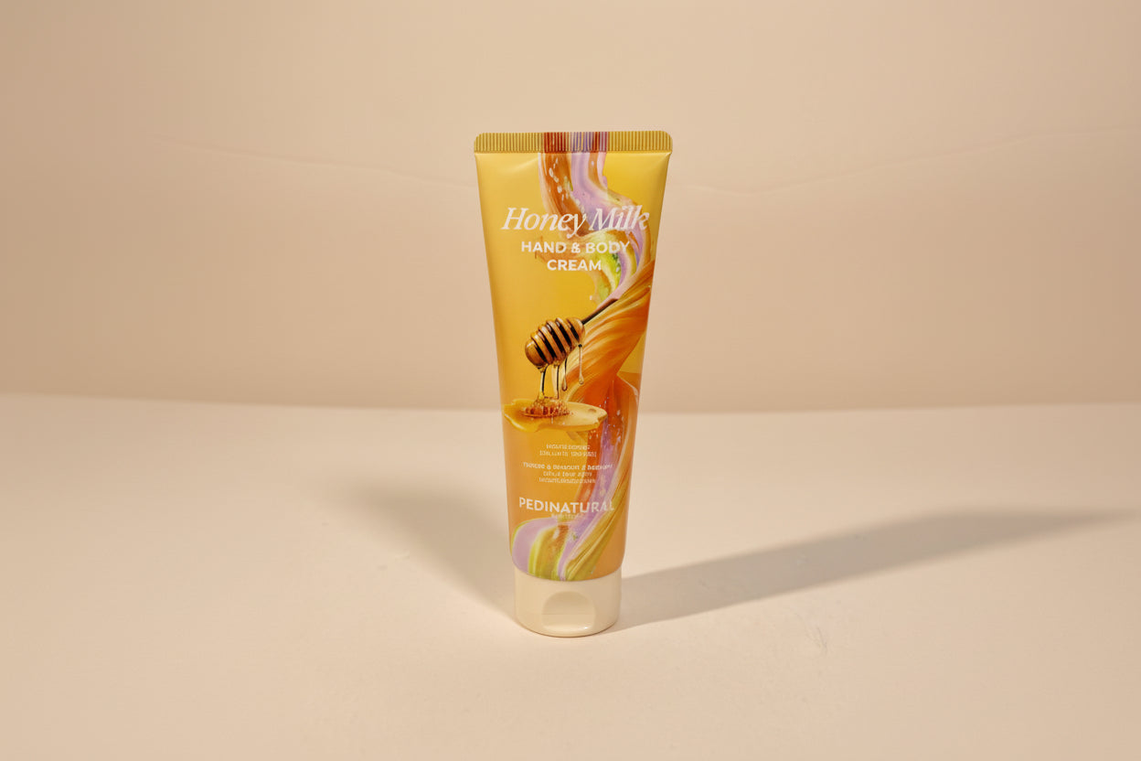 Tube of Honey Milk Hand & Body Cream on a white background