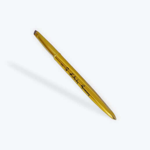 Gold pen with brand name on a white background