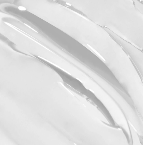 Close-up of white, glossy paint texture
