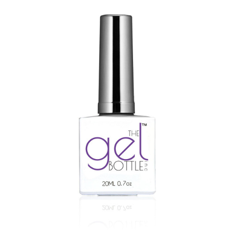 White nail polish bottle with silver cap on a white background