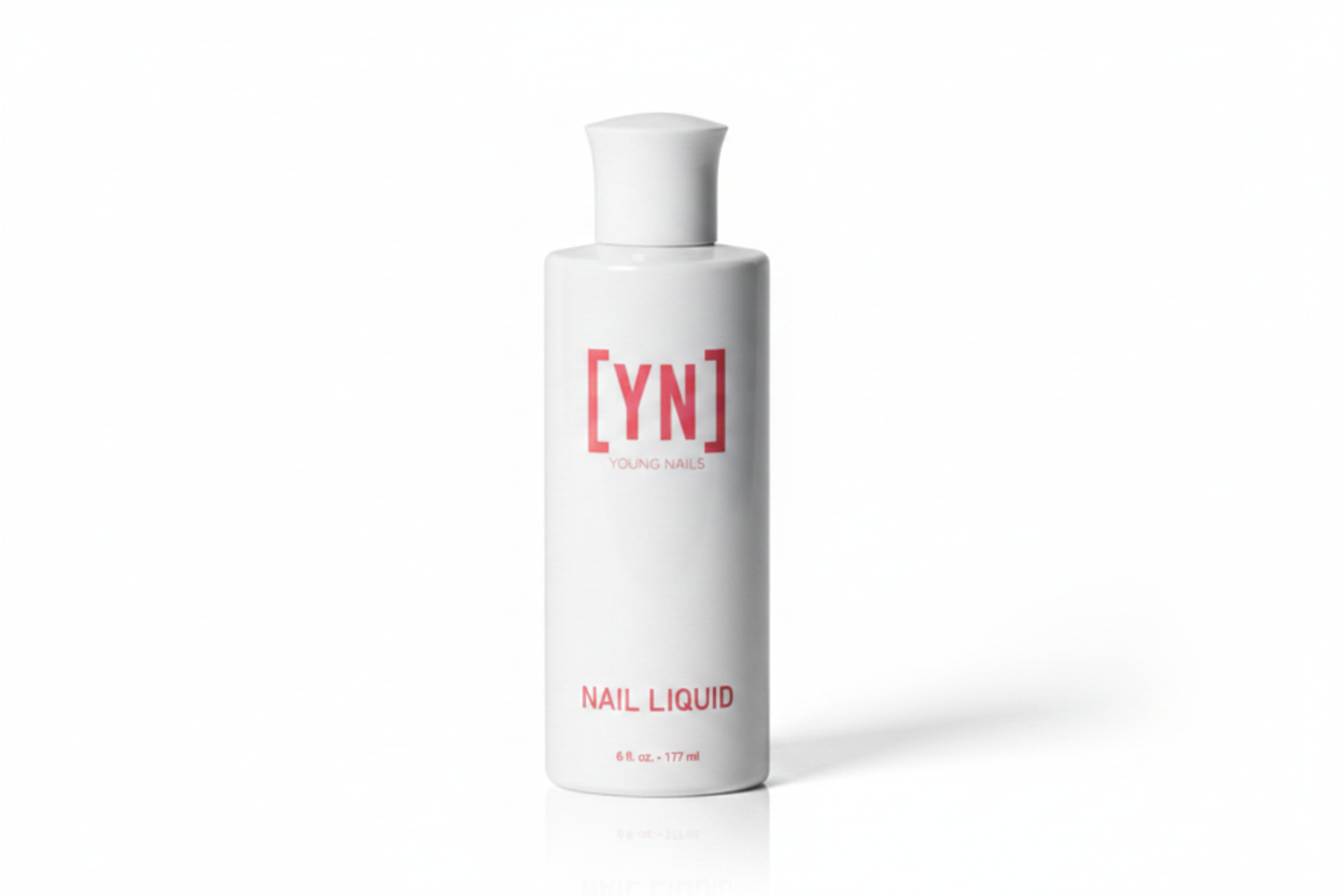 Bottle of nail liquid with 'YN' branding on a pink background