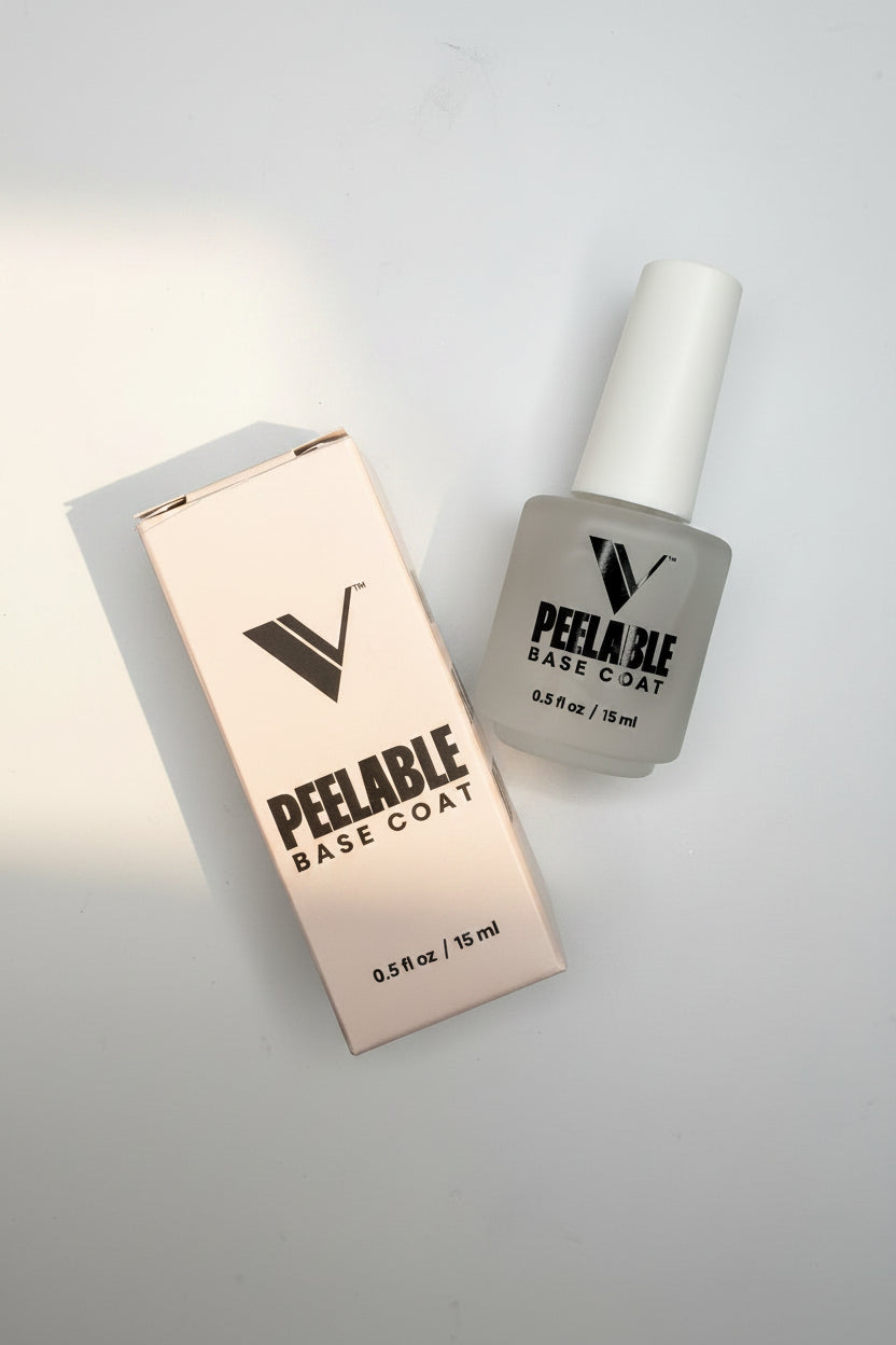 Nail polish bottle and packaging of Peelable Base Coat on a light gray background